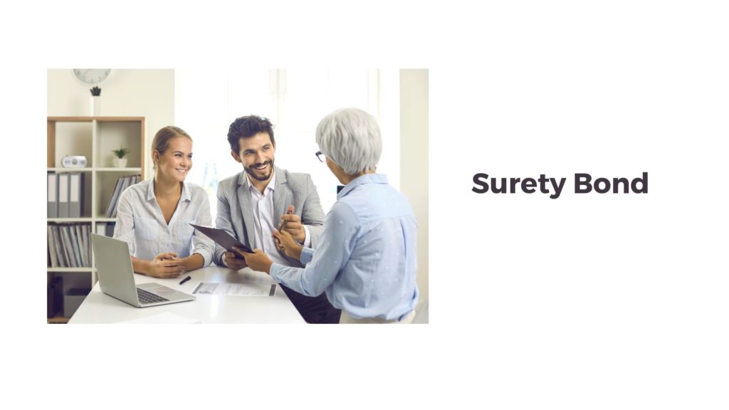 Surety Bond - Surety agent is talking to a business couple in a table. Explaining about the bonds they need.